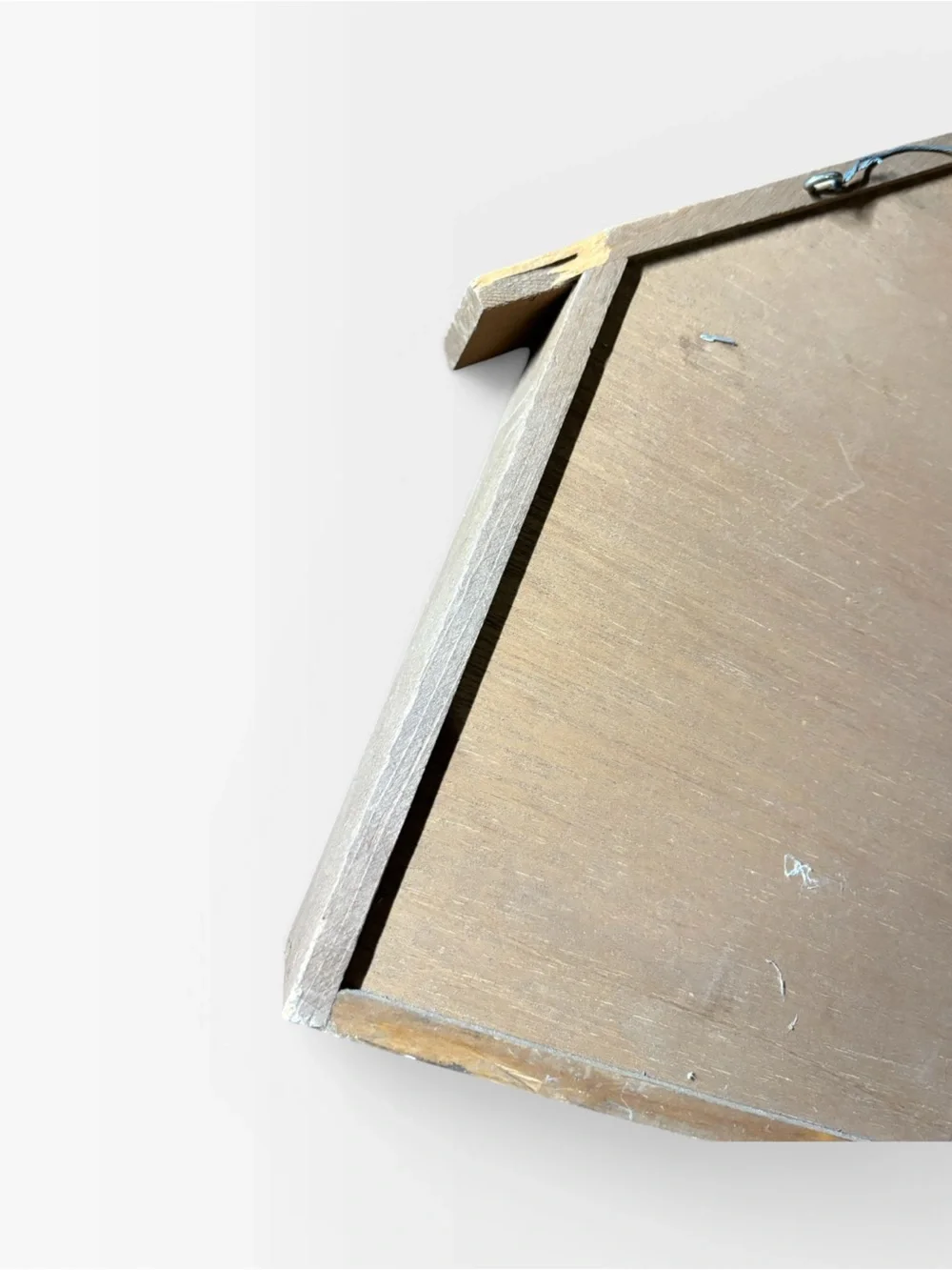 Small house trinket shelf hung by wire